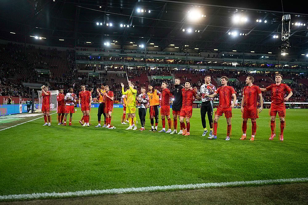 | Photo: AP/Matthias Schrader : Bundesliga: Augsburg vs Bayern Munich