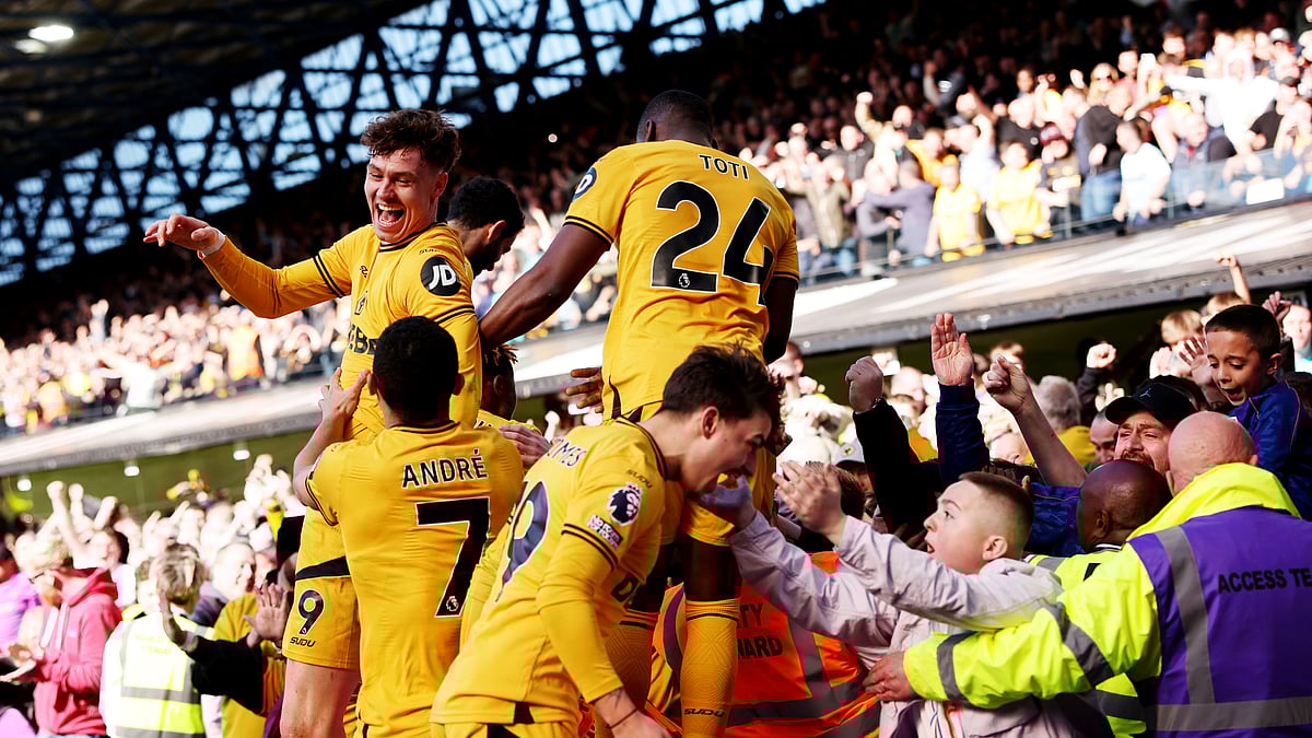 Wolves' players celebrate Jorgen Strand Larsen's winner at Portman Road.