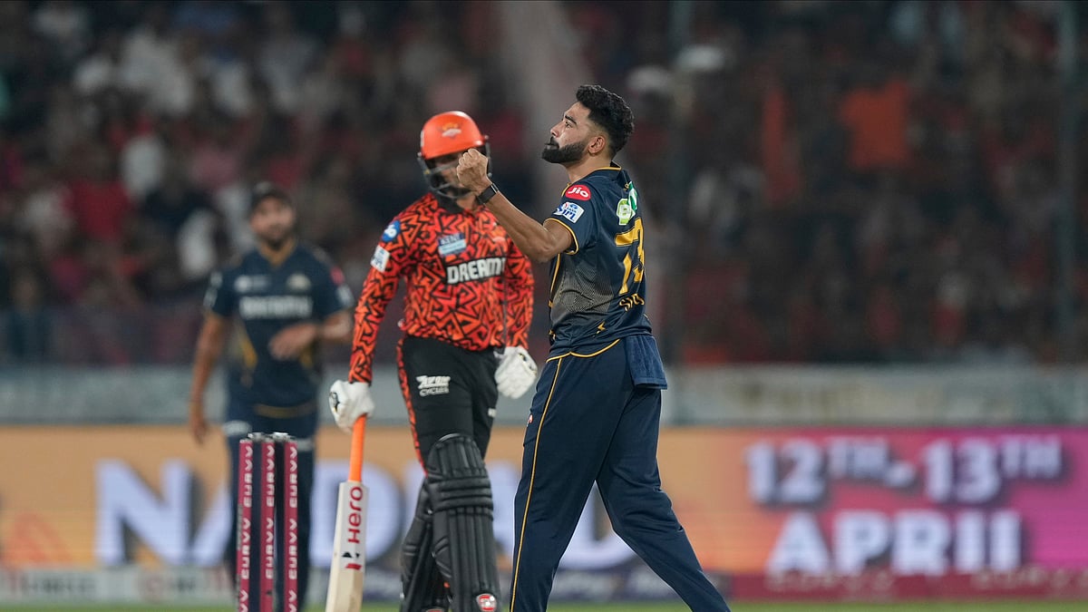 Gujarat Titans Mohammed Siraj celebrates the wicket of Abhishek. AP