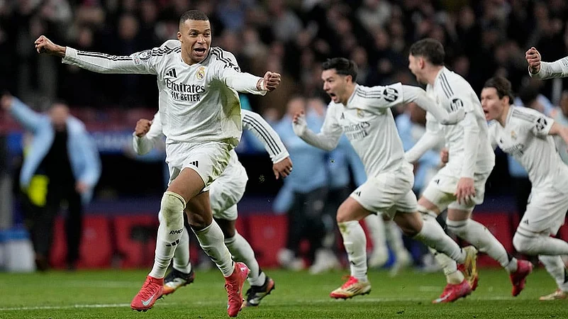 Real Madrids Kylian Mbappe celebrates after winning