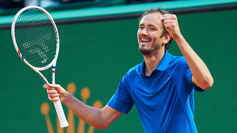 Daniil Medvedev celebrates after converting match point