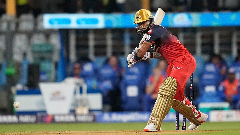 Photo: AP : Royal Challengers Bengaluru's Virat Kohli plays a shot during the Indian Premier League match against Mumbai Indians.