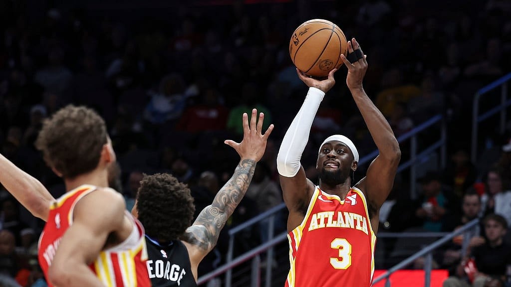 AP/Colin Hubbard : Atlanta Hawks guard Caris LeVert (3) attempts to shoot against Utah Jazz guard Keyonte George, second from right, during the first half of an NBA basketball game, Sunday, April 6, 2025, in Atlanta.