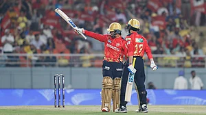 AP Photo/Surjeet Yadav : Punjab Kings' Priyansh Arya, left, celebrates after scoring fifty runs during the Indian Premier League cricket match between Punjab Kings and Chennai Super Kings at Maharaja Yadavindra Singh Cricket Stadium in Mohali.