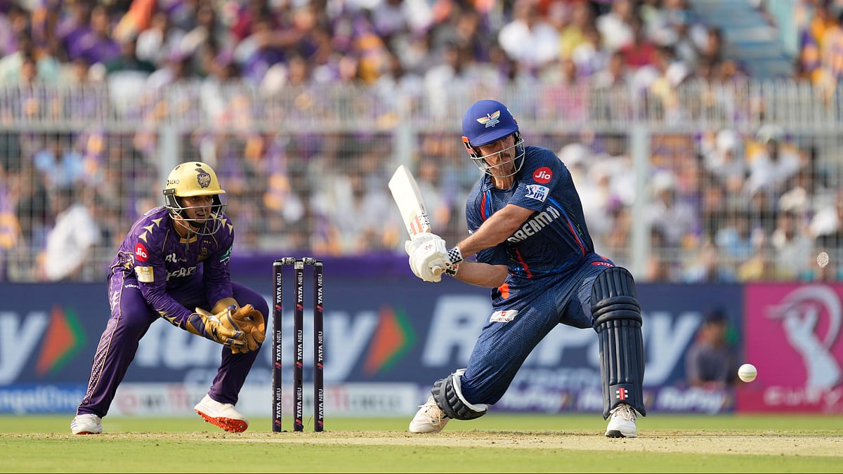 AP Photo/Bikas Das : Lucknow Super Giants' Mitchell Marsh plays a shot during the Indian Premier League cricket match between Kolkata Knight Riders and Lucknow Super Giants at Eden Gardens in Kolkata.