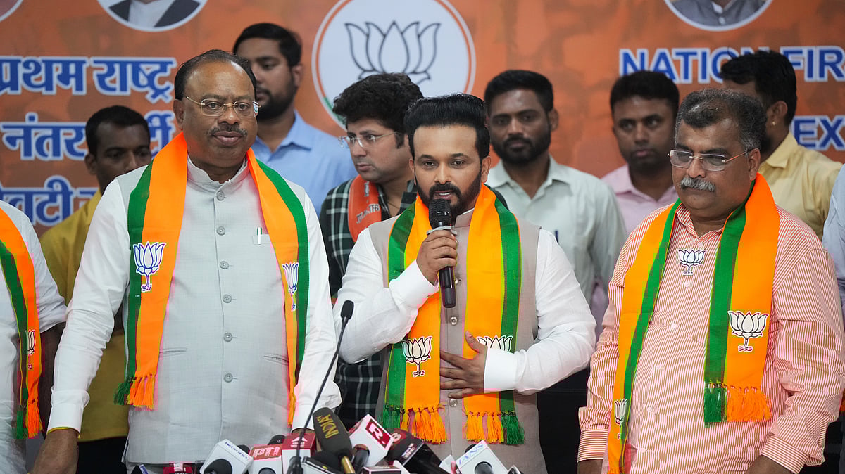 PTI Photo/Shashank Parade : Former cricketer Kedar Jadhav speaks after joining BJP in the presence of Maharashtra BJP President Chandrashekhar Bawankule, in Mumbai.