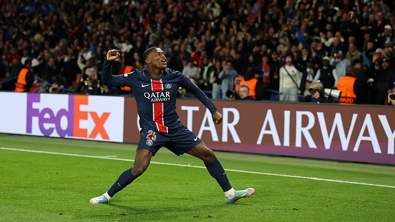 Nuno Mendes celebrates after scoring Paris Saint-Germain's third goal - null