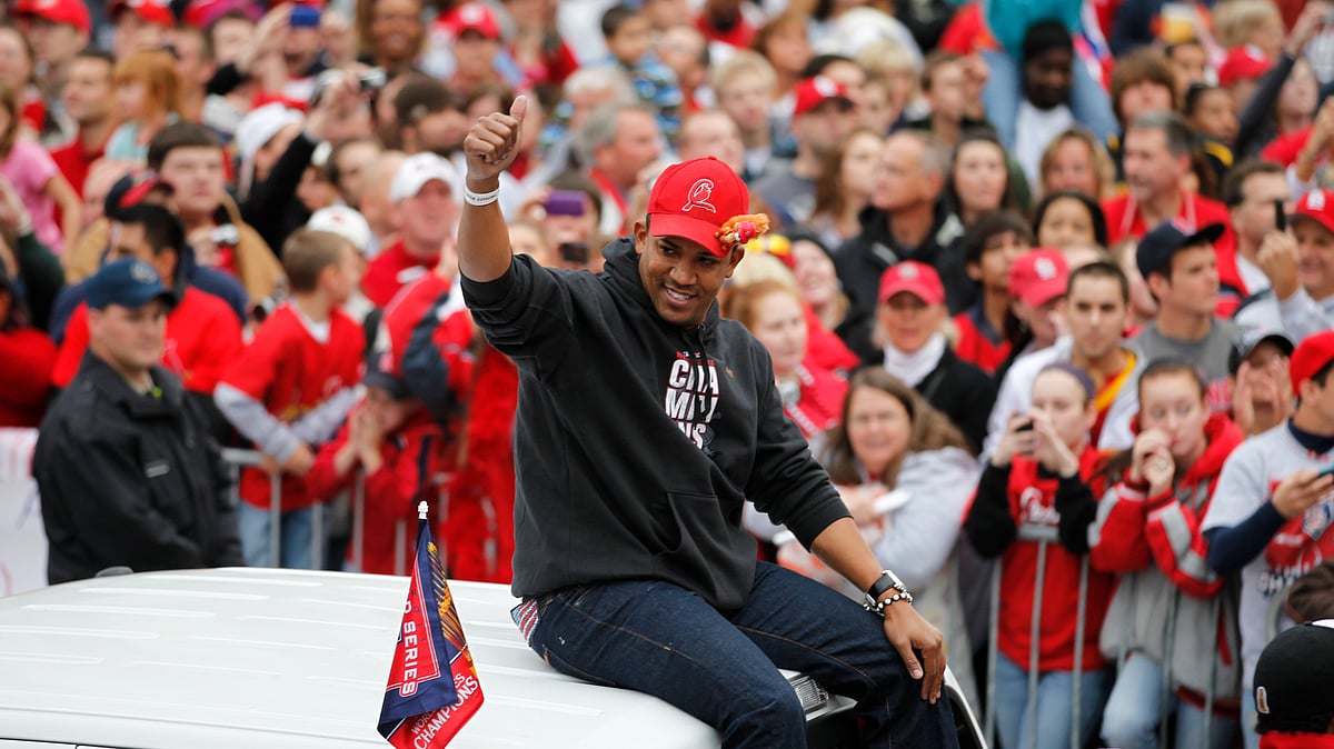 | AP Photo/Jeff Roberson, File : St. Louis Cardinals relief pitcher Octavio Dotel participates in a victory parade after defeating the Texas Rangers to win their 11th World Series in franchise history Sunday, Oct. 30, 2011, in St. Louis.