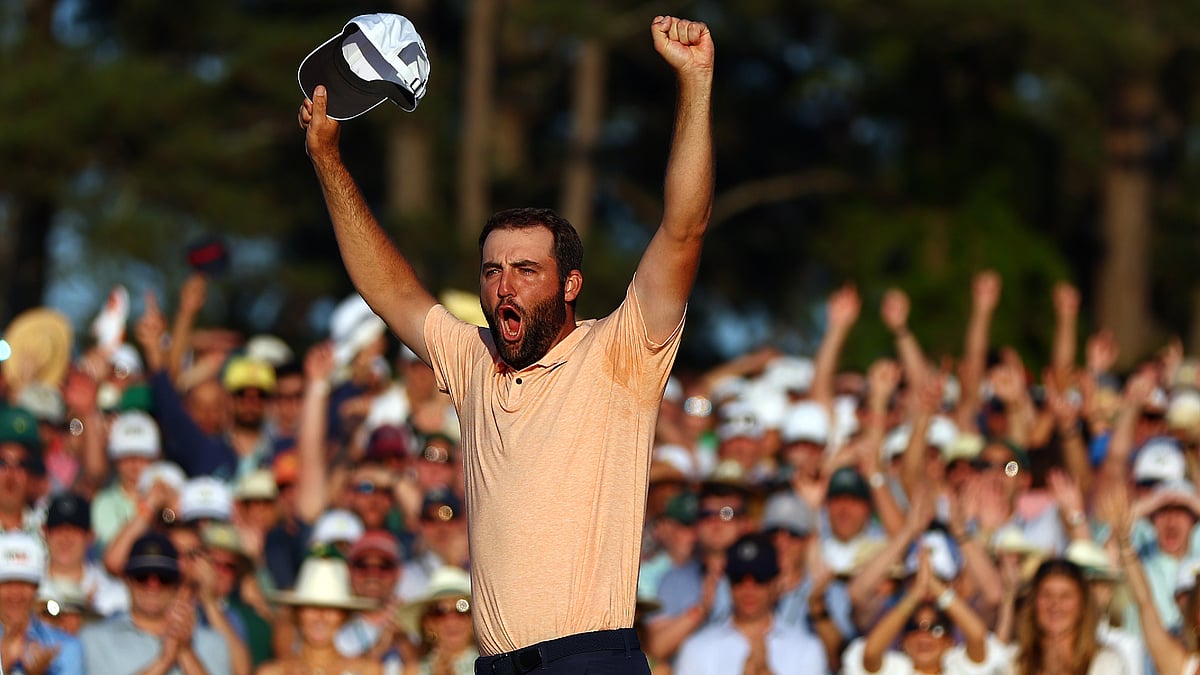 Scottie Scheffler celebrates after winning the 2024 Masters