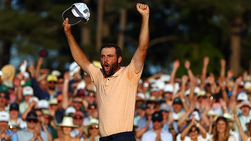 Scottie Scheffler celebrates after winning the 2024 Masters