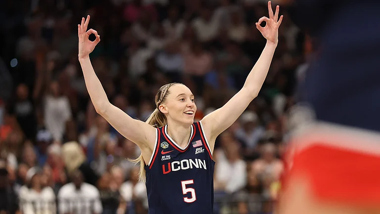 UConn star Paige Bueckers will likely be the first overall pick of the 2025 WNBA draft by the Dallas Wings. - null