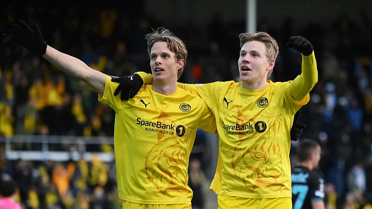Ulrik Saltnes and Jens Petter Hauge celebrate the former's goal - null