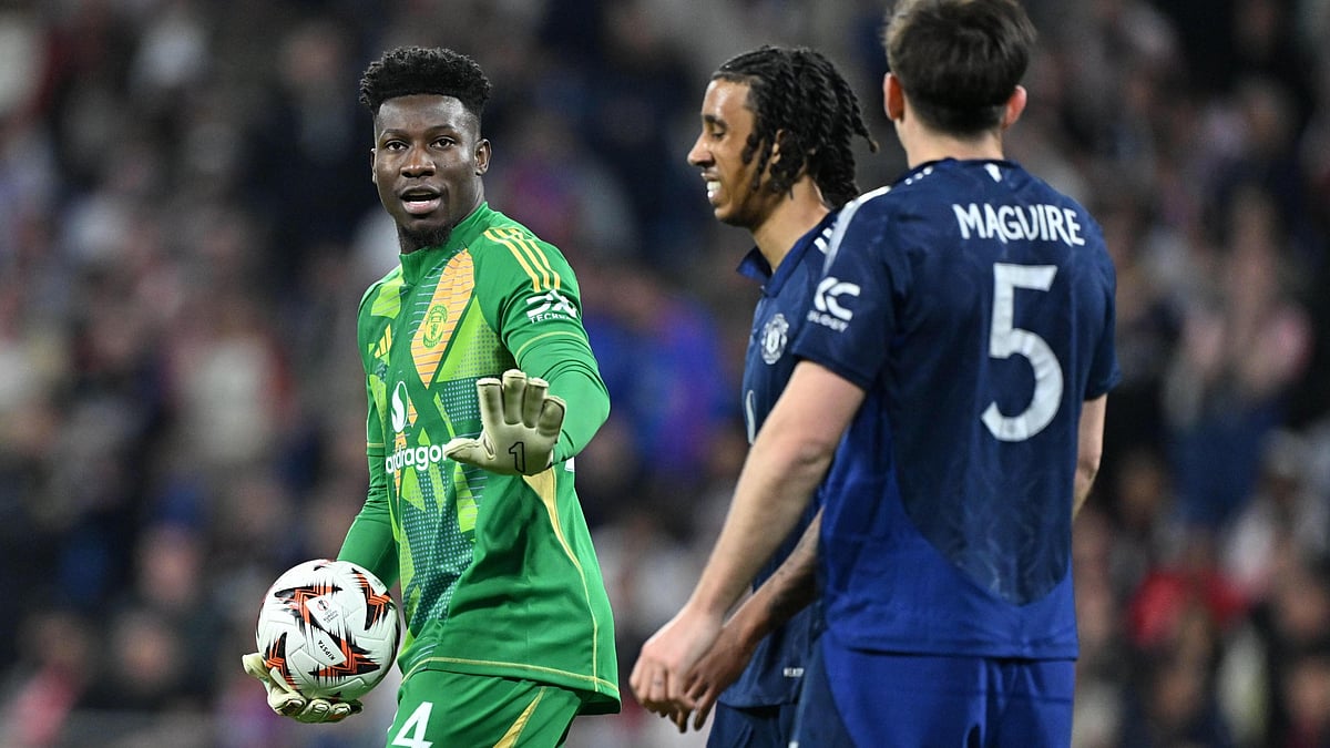 Manchester United's Andre Onana apologises after mistakes against Lyon. - null