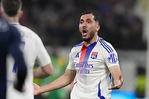 AP : Lyon's Rayan Cherki reacts during the Europa League quarterfinal first leg soccer match between Lyon and Manchester United at Groupama stadium in Decines, outside Lyon, France, Thursday, April 10, 2025.