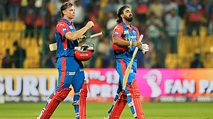 AP : Delhi Capitals' KL Rahul, right, and his batting partner Tristan Stubbs walk off the field after winning the Indian Premier League match against Royal Challengers Bengaluru.