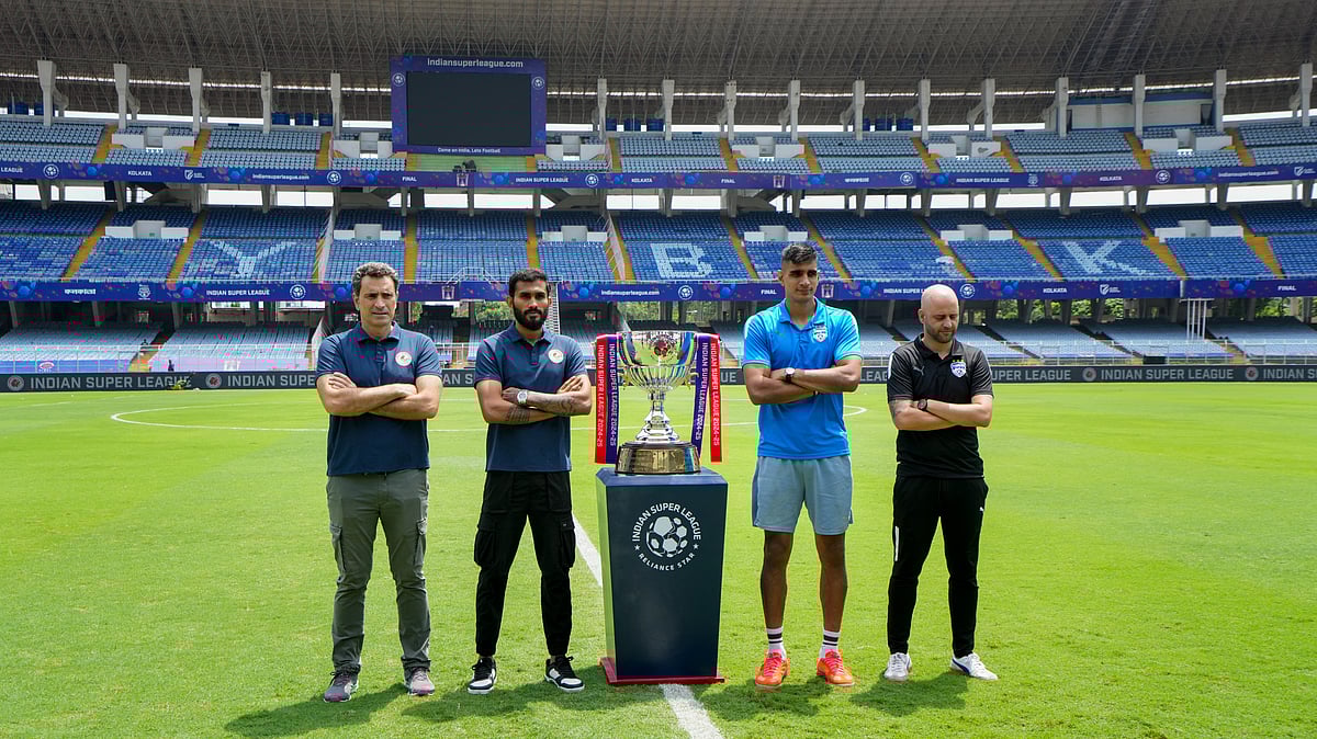 PTI : (From left) Mohun Bagan Super Giant coach Jose Molina with captain Subhasish Bose, Bengaluru FC captain Gurpreet Singh Sandhu and coach Gerard Zaragoza pose with the Indian Super League trophy on the eve of the final.