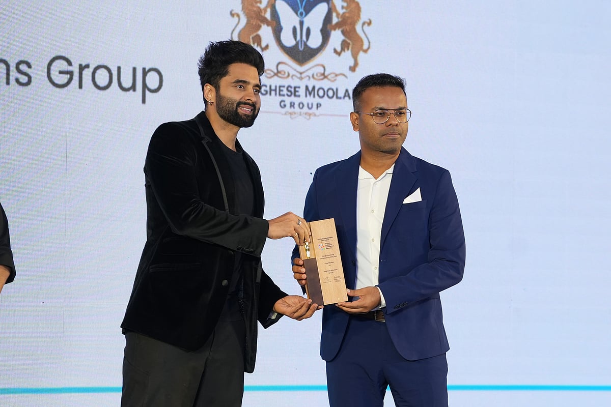 Vijay Moolan receiving the award