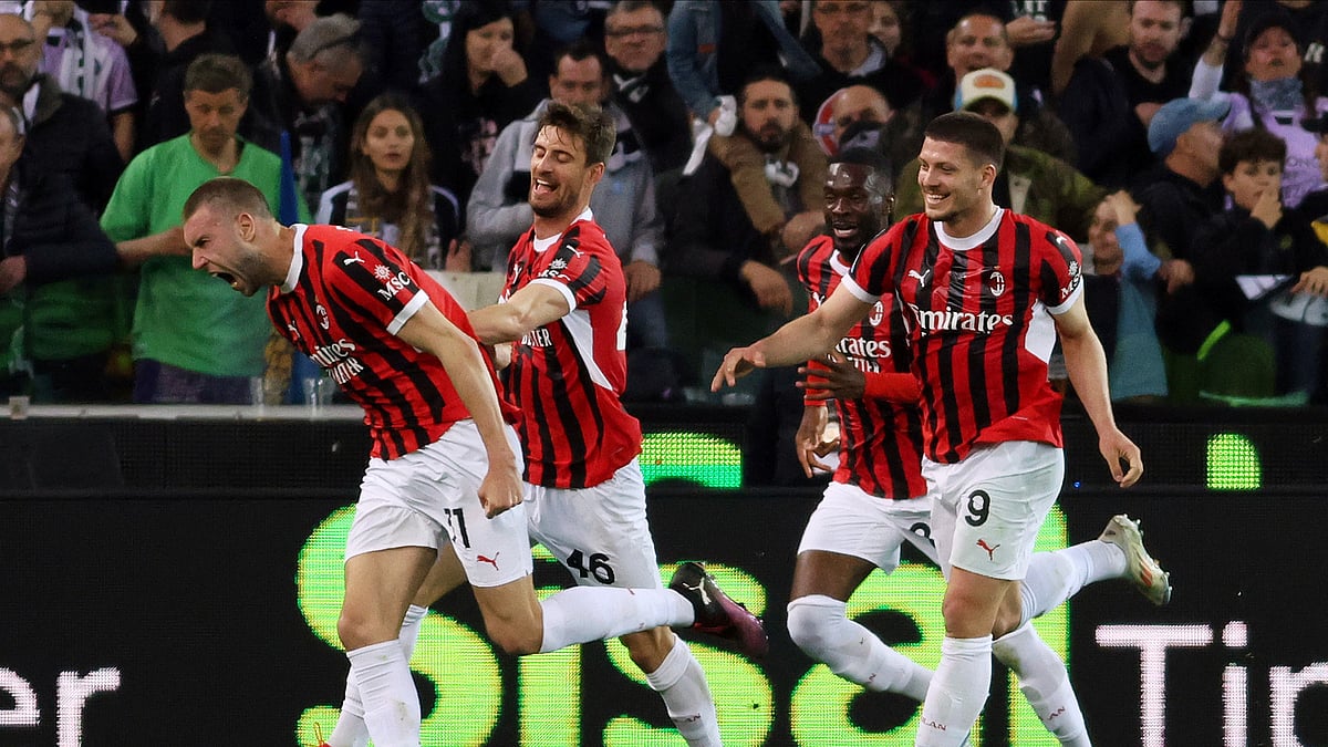 Andrea Bressanutti/LaPresse via AP : AC Milan's Strahinja Pavlovic, left, celebrates scoring during the Serie A football match between Udinese and Milan at the Bluenergy Stadium in Udine, Italy.