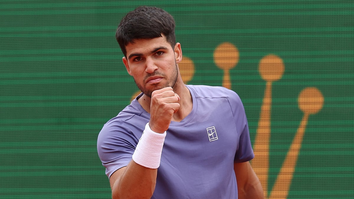 Carlos Alcaraz celebrates during his semi-final victory