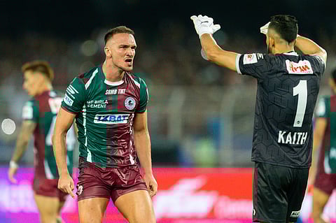 Mohun Bagan's Tom Aldred celebrates with Vishal Kaith.