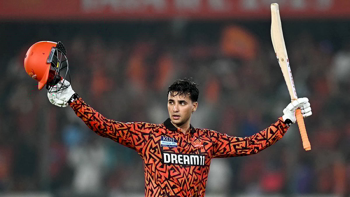 Abhishek Sharma celebrates scoring his maiden IPL century