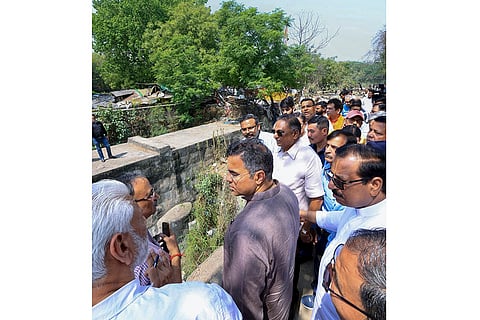 Parvesh Verma inspects a drain in Delhi