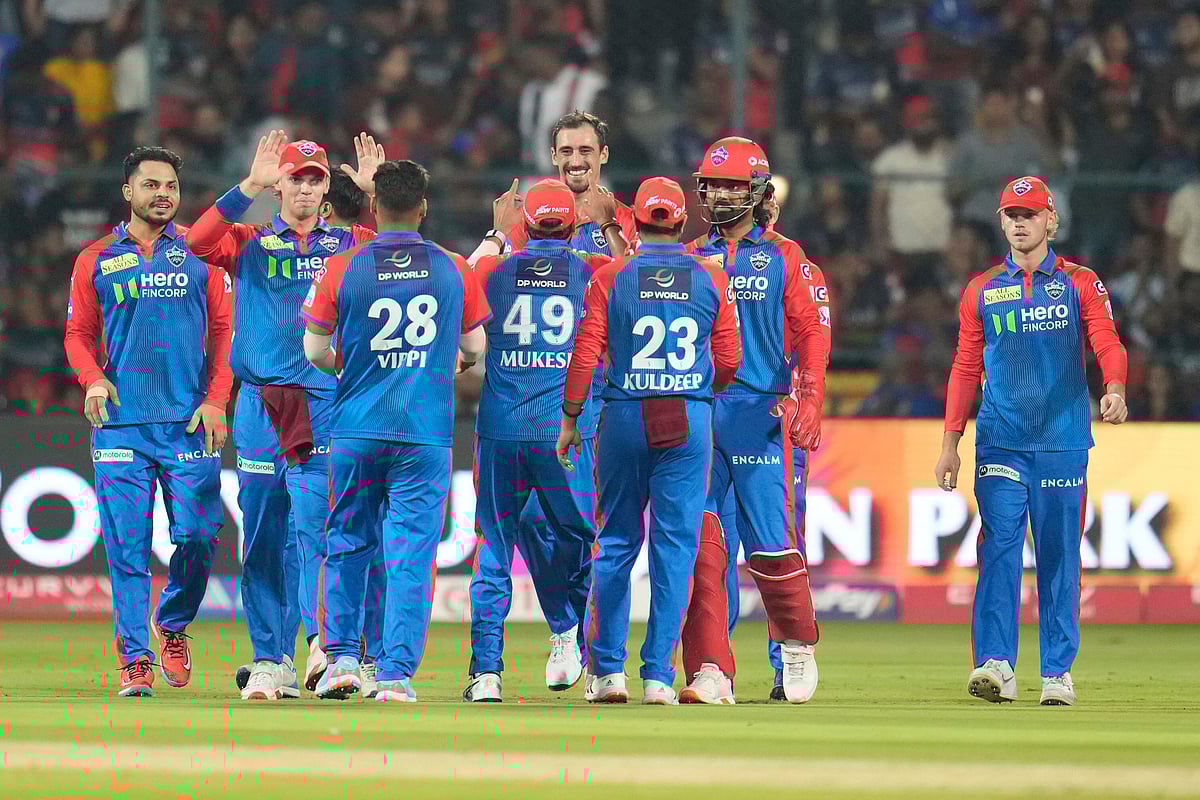  (AP Photo/Aijaz Rahi)
 : Delhi Capitals' Vipraj Nigam (28) celebrates with teammates after the dismissal of Royal Challengers Bengaluru's Virat Kohli during the Indian Premier League cricket match between Royal Challengers Bengaluru and Delhi Capitals at Stadium in Bengaluru, India, Thursday, April 10, 2025.

