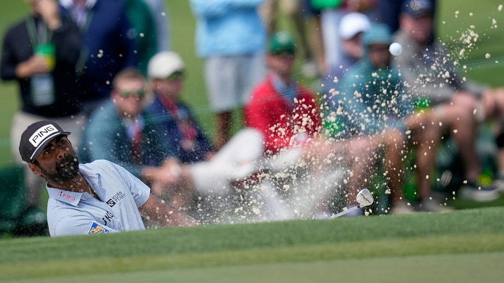 (AP Photo) : Sahith Theegala hits from the bunker on the second hole during the third round at the Masters golf tournament.