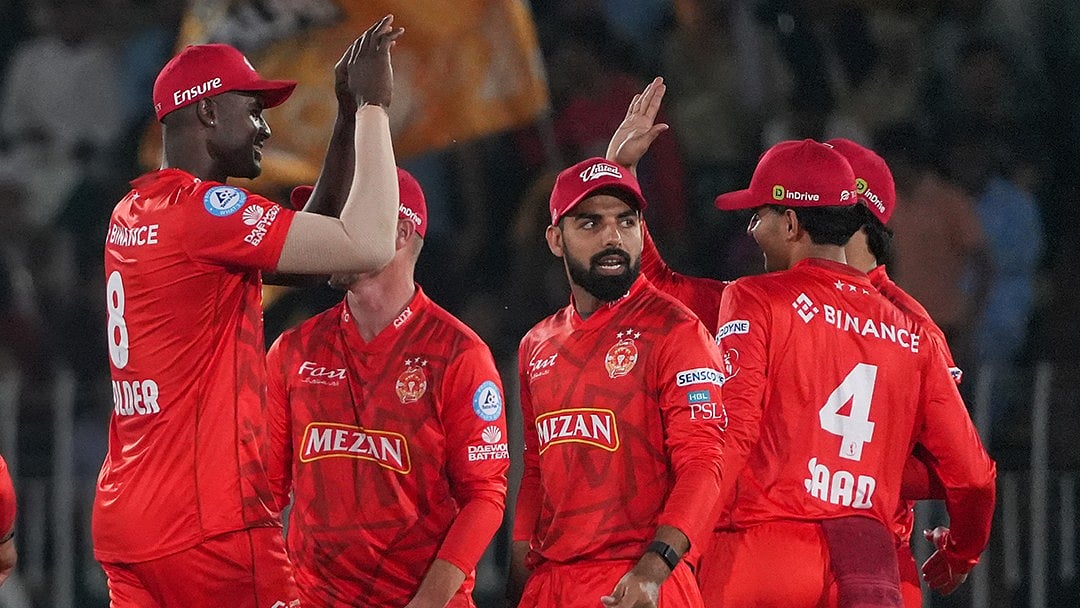 Photo: X/Pakistan Super League : Islamabad United celebrate a Peshawar Zalmi wicket during the Pakistan Super League match.