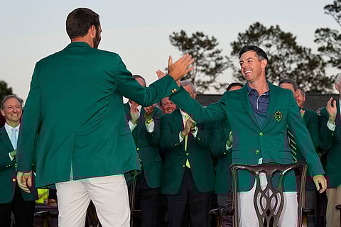Masters Golf: Scottie Scheffler, left, with Rory McIlroy