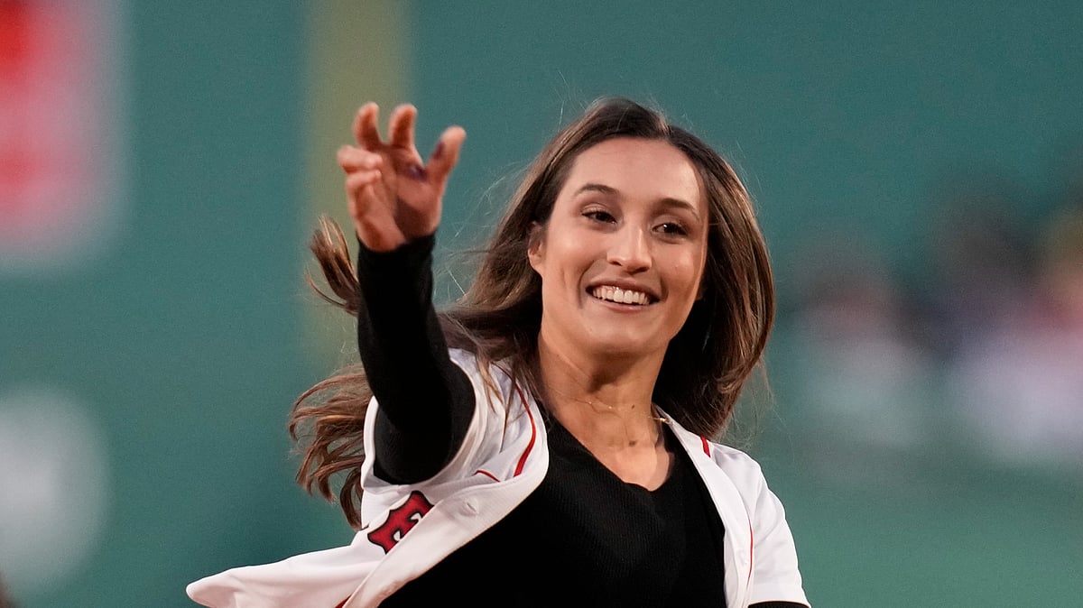  (AP Photo/Charles Krupa, File)
 : FILE - MIT women's soccer graduate student Karenna Groff throws a ball prior to a baseball game at Fenway Park, Monday, April 3, 2023, in Boston.
