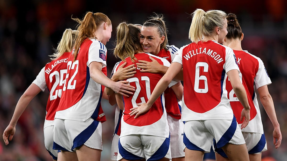 Arsenal celebrate their fifth goal against Leicester City.