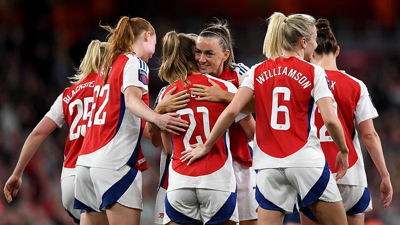 Arsenal celebrate their fifth goal against Leicester City.