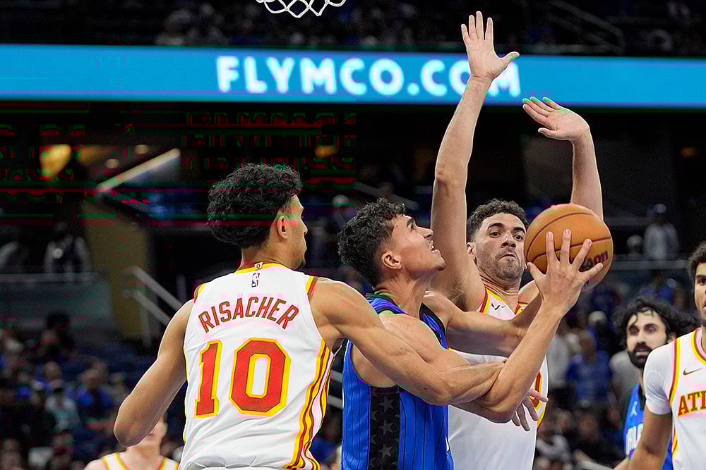 | Photo: AP/John Raoux : NBA: Atlanta Hawks vs Orlando Magic