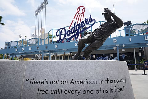 A statue of Jackie Robinson is seen at Los Angeles' Dodger Stadium on Jackie Robinson Day before a baseball game between the Los Angeles Dodgers and Colorado Rockies on April 15, 2025.