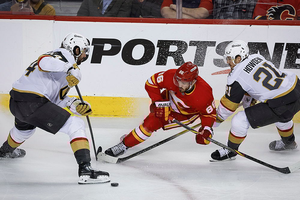 | Photo: Jeff McIntosh/The Canadian Press via AP : NHL Hockey: Calgary Flames Vs Vegas Golden Knights
