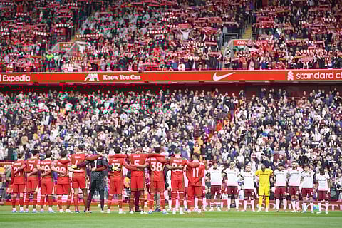 Liverpool and West Ham teams observe a minute of silence for the victims of the Hillsborough Disaster ahead of the English Premier League soccer match between Liverpool and West Ham United at Anfield in Liverpool, Sunday, April 13, 2025.