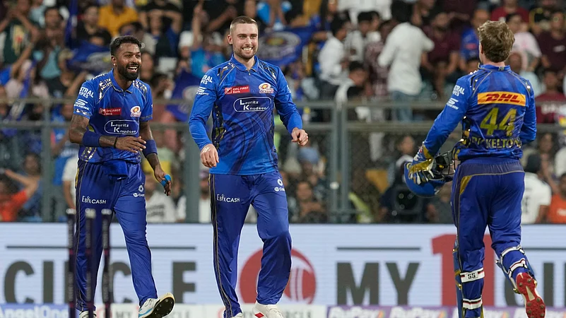 Mumbai Indians Will Jacks, center, celebrates with teammates. AP