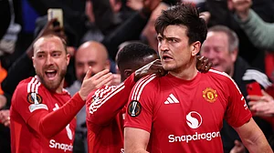 Harry Maguire celebrates after scoring Manchester United's winner