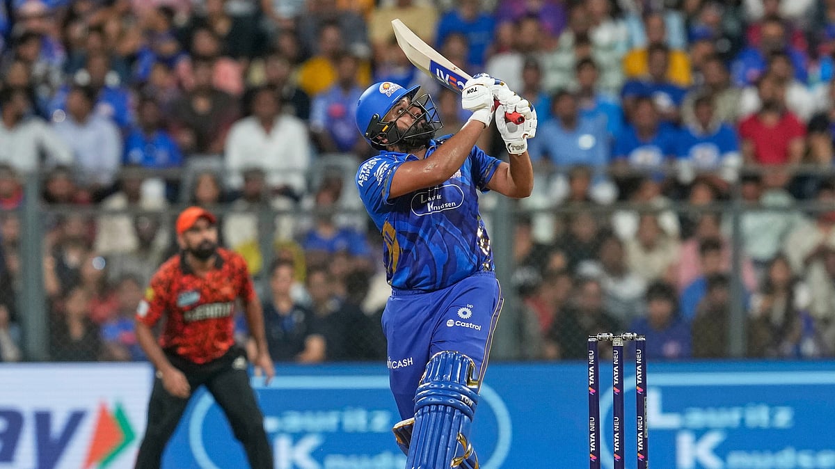 AP Photo/Rajanish Kakade : Mumbai Indians' Rohit Sharma bats during the Indian Premier League cricket match between Mumbai Indians and Sunrisers Hyderabad at Wankhede Stadium in Mumbai.