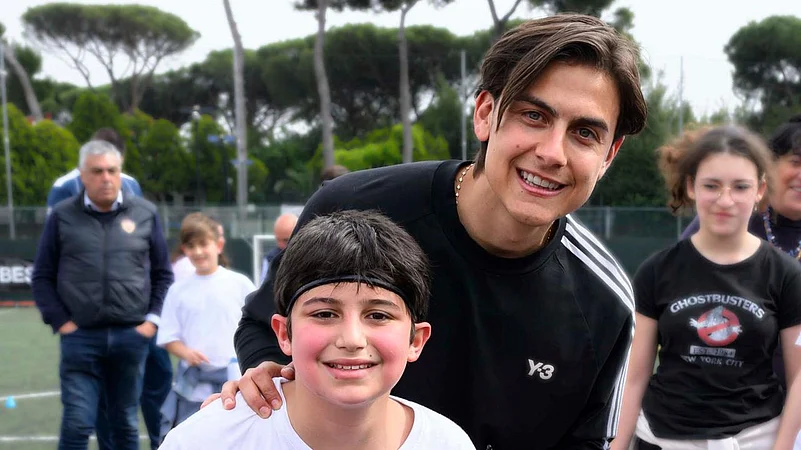 Paulo Dybala attends the Sport for Good programme in Rome.