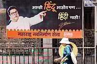 Inside ‘Batoge toh Peetoge’ Controversy Attributed to MNS in Mumbai Photo: PTI/Kunal Patil : MNS poster near Shiv Sena Bhavan in Mumbai