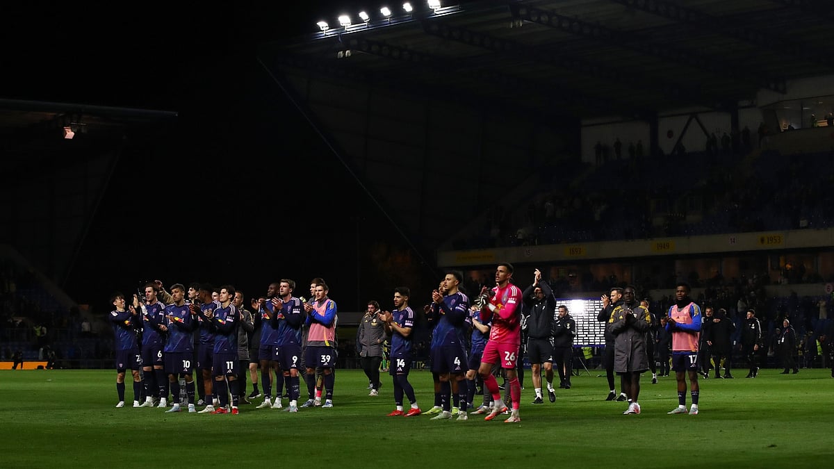 File : Leeds United players celebrate their win over Oxford United.