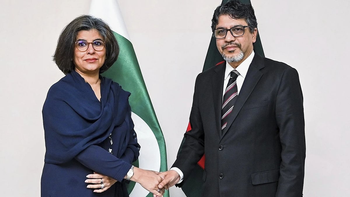 | AP : Bangladesh Foreign Secretary Md. Jashim Uddin, right, shakes hands with Pakistan Foreign Secretary Amna Baloch as they pose for a photograph during their bilateral meeting in Dhaka, Thursday, April 17, 2025.