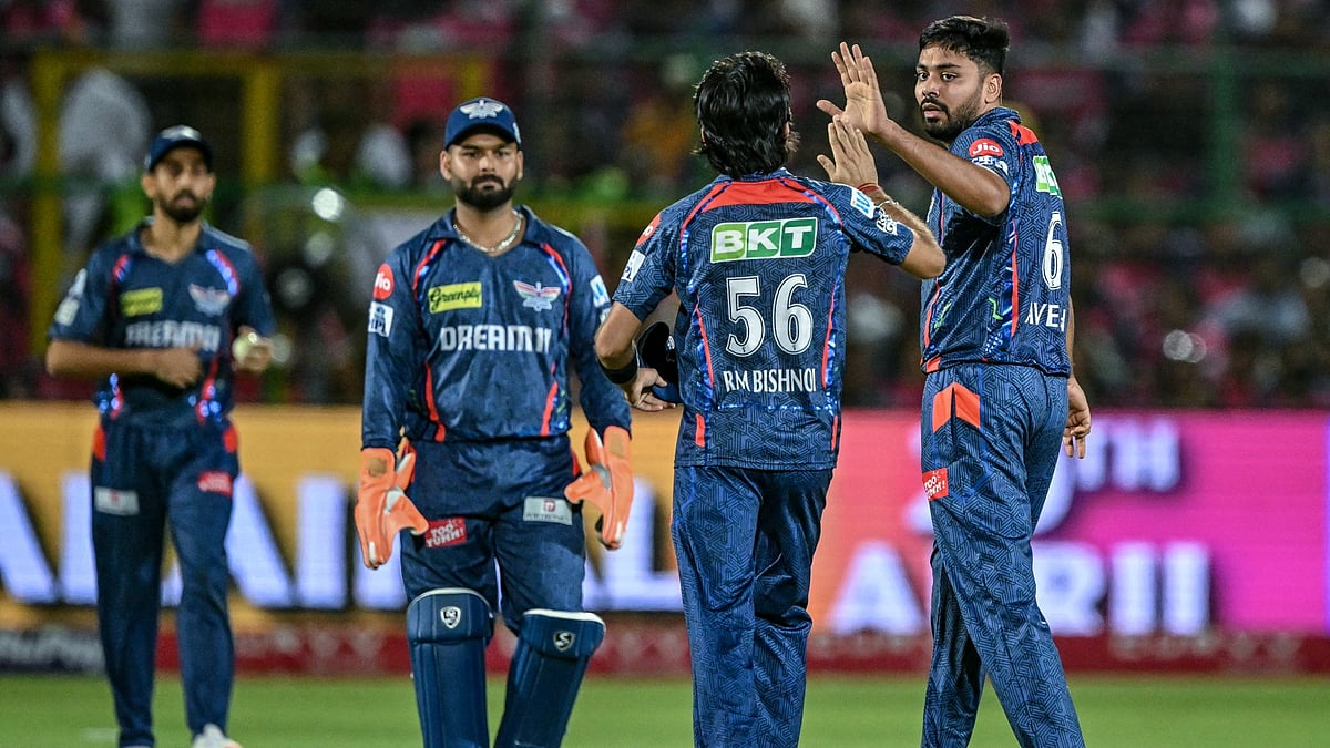 Lucknow Super Giants celebrate taking a wicket against Rajasthan Royals.