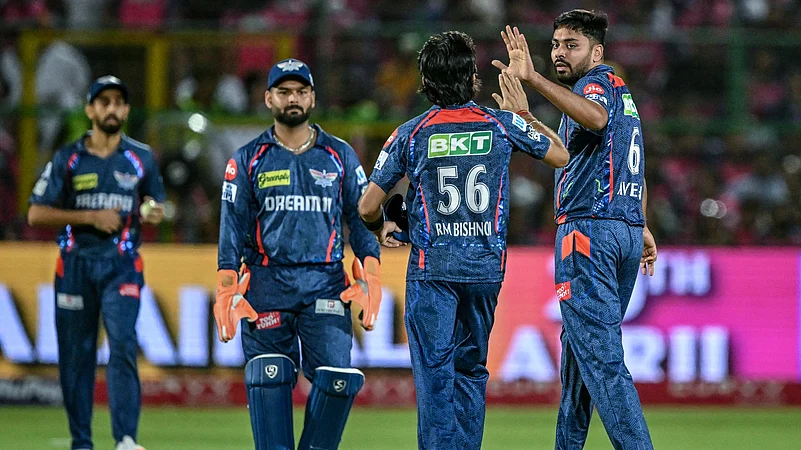 Lucknow Super Giants celebrate taking a wicket against Rajasthan Royals.