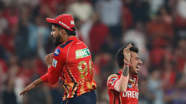 Punjab Kings' captain Shreyas Iyer, left, and teammate Yuzvendra Chahal celebrate after their win in the Indian Premier League cricket match against Kolkata Kings Riders at Maharaja Yadavindra Singh Cricket Stadium in Mohali. - AP Photo/Surjeet Yadav
