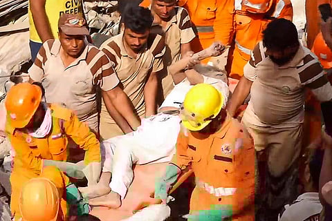 11 dead, several feared trapped after building collapses