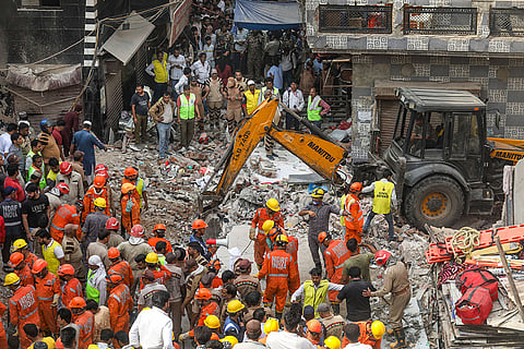 Four dead, several feared trapped after four-storey building collapses in northeast Delhi