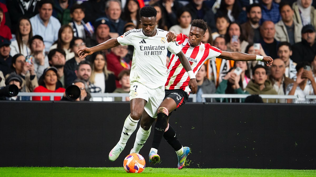 | Photo: X / Athletic_en : Athletic Club's Alvaro Djalo challenges Real Madrid's Vinicius Jr.